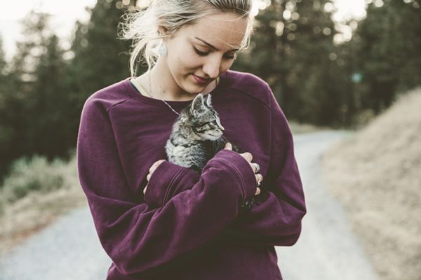Woman Holding Kitten